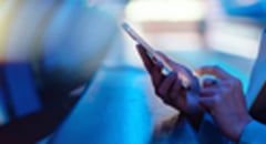 hands-holding-phone-240x130