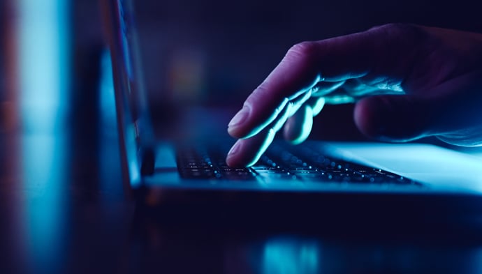 hand-typing-690x393